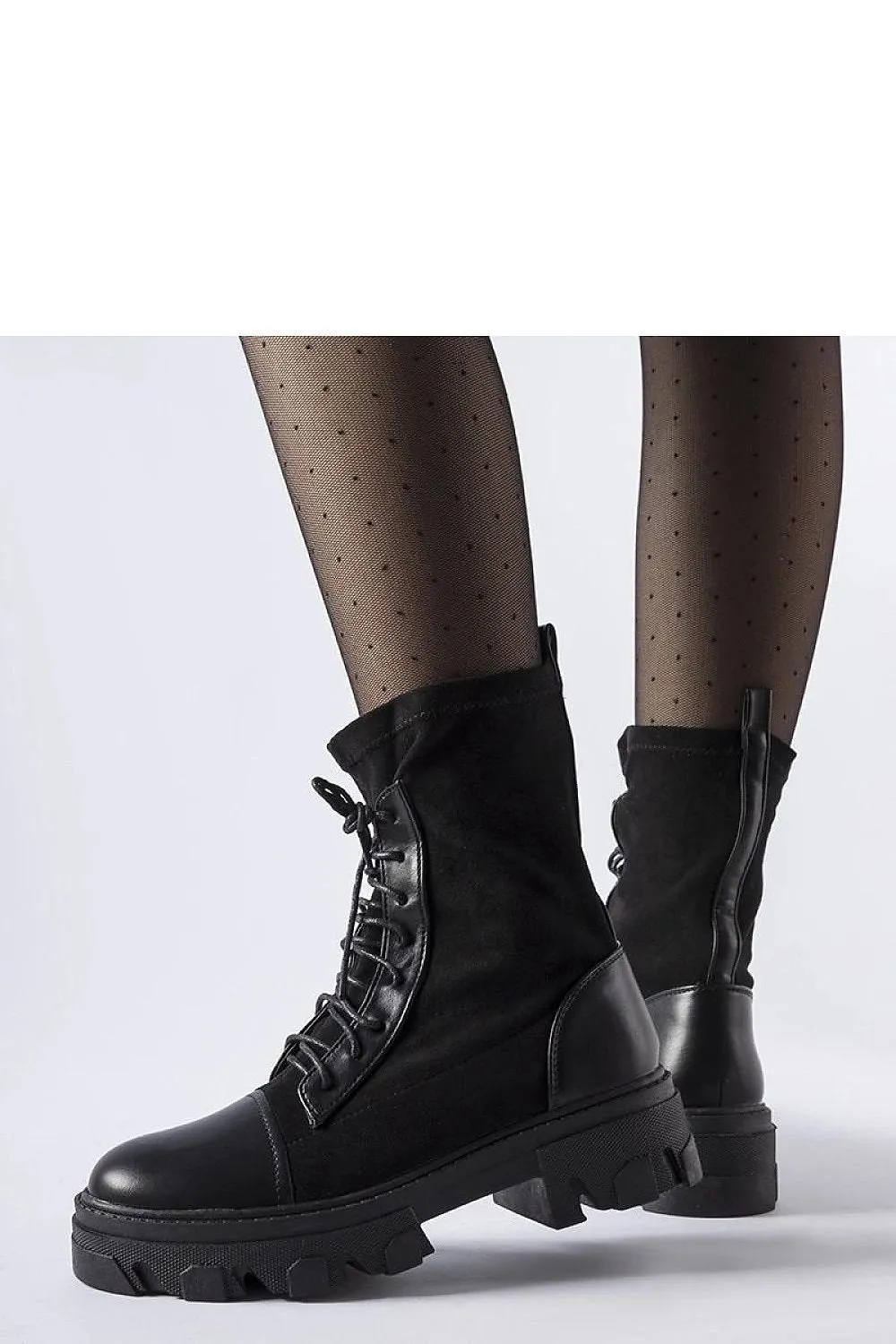 Black slip-on boots with lacing