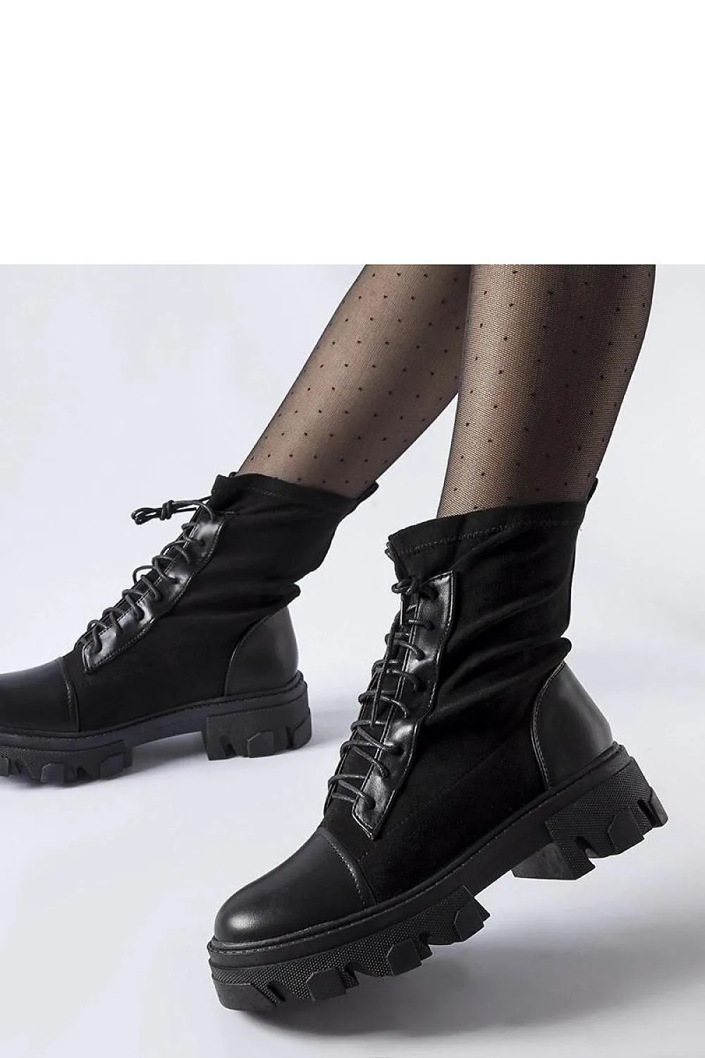 Black slip-on boots with lacing