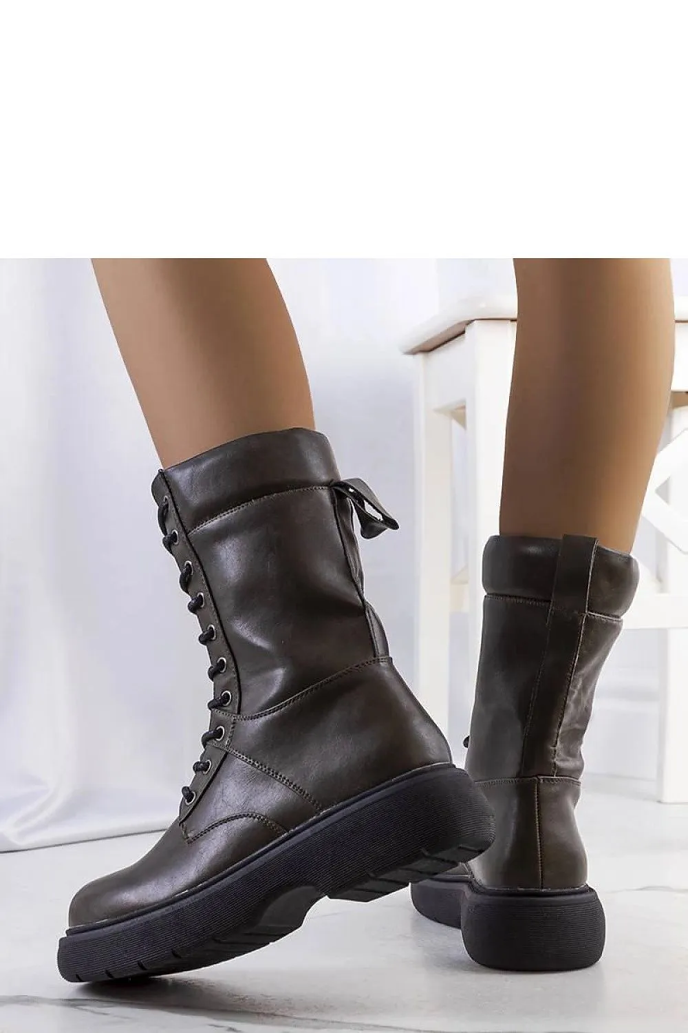 Women's green denim boots